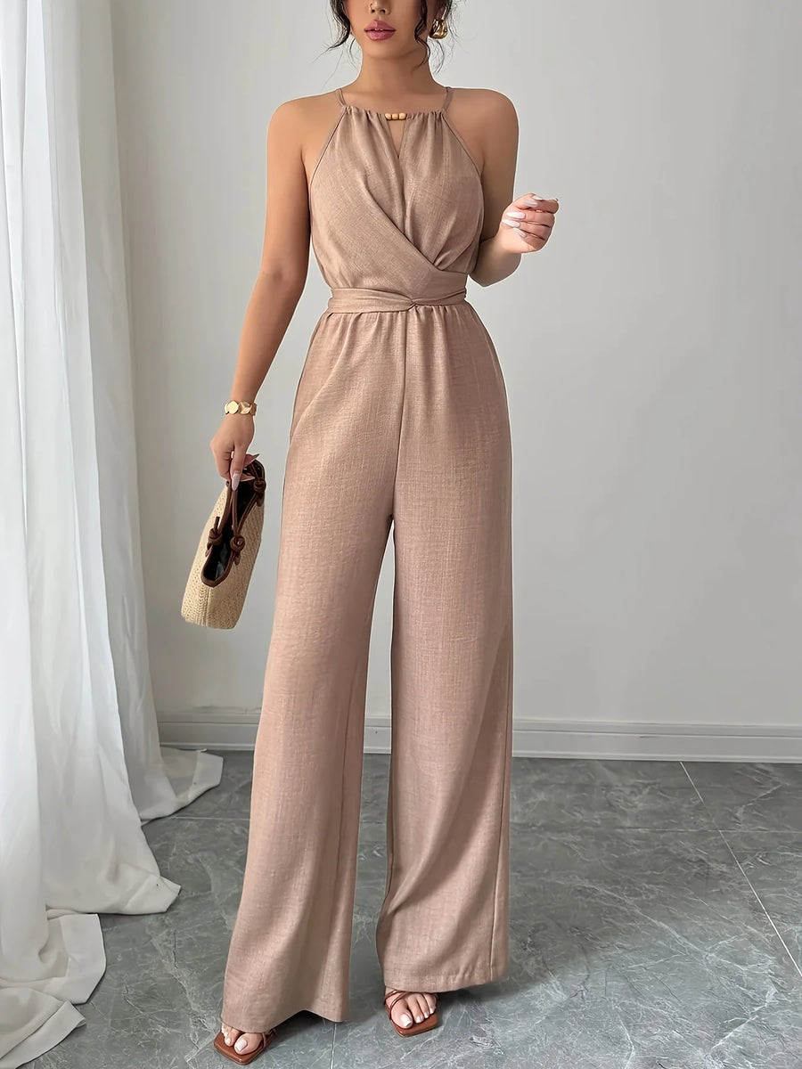 Chiffon halter neck maxi jumpsuit with a lace-up waist, front view