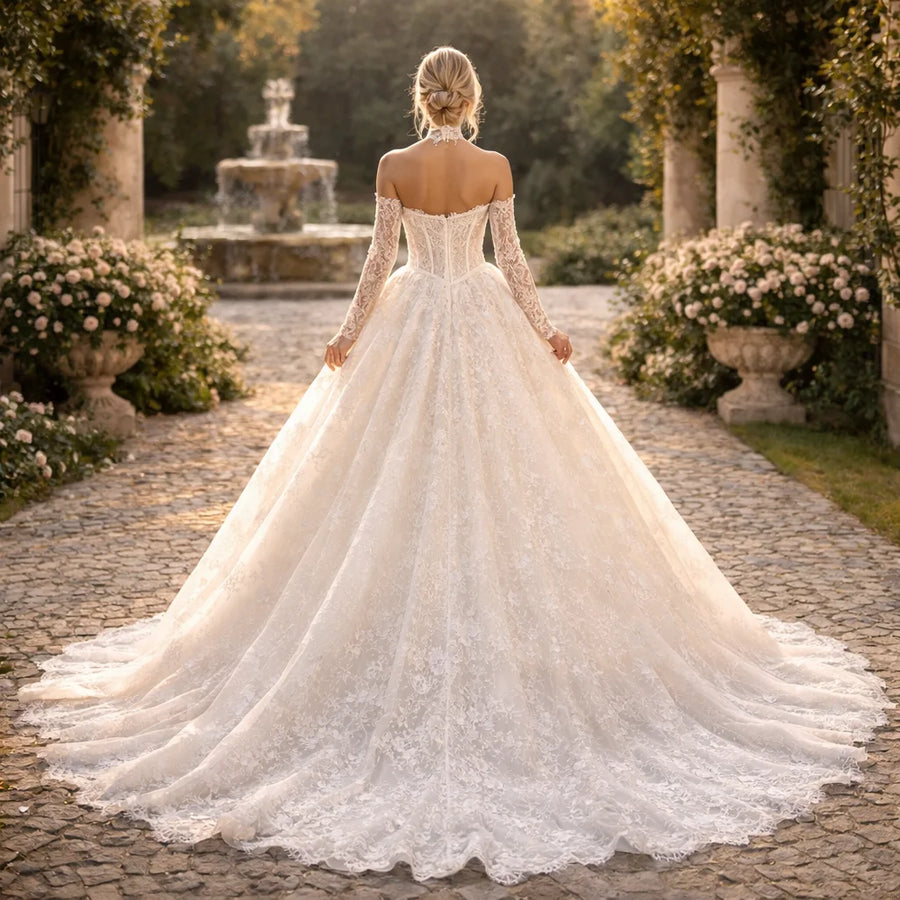 Off-shoulder lace ball gown with a court train, photo 2.