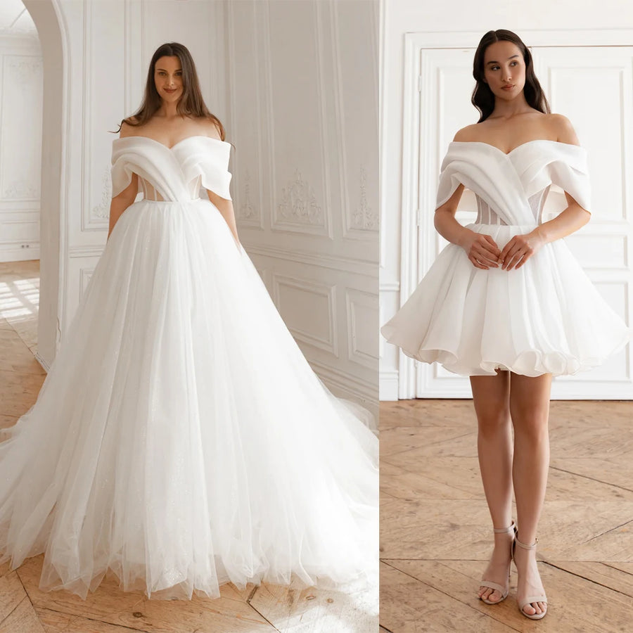Strapless organza two-piece bridal gown with a court train, front view.