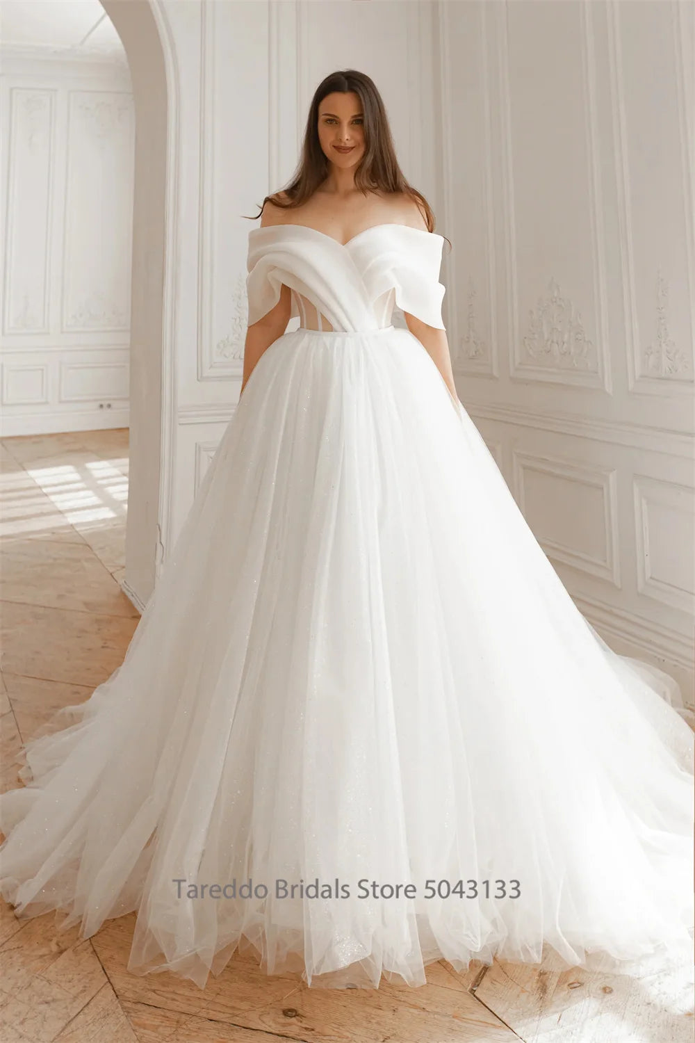 Strapless organza two-piece bridal gown with a court train, photo 2.
