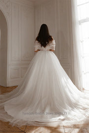 Strapless organza two-piece bridal gown with a court train, photo 3.
