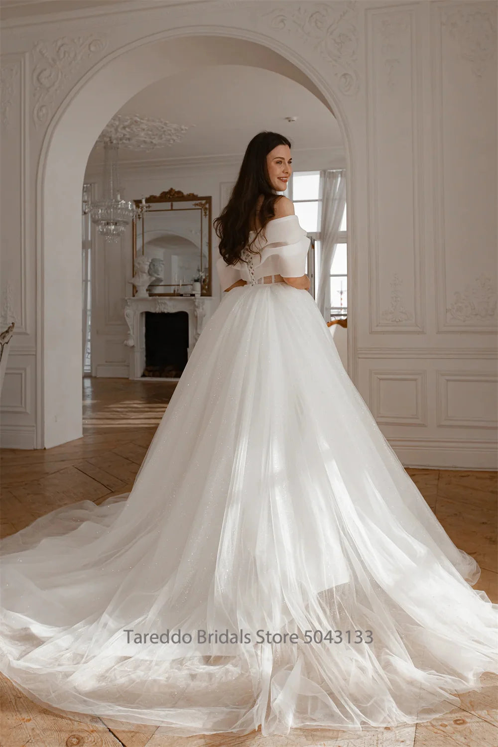 Strapless organza two-piece bridal gown with a court train, photo 4.
